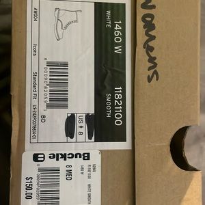 White, size 8 women’s Dr. Martens